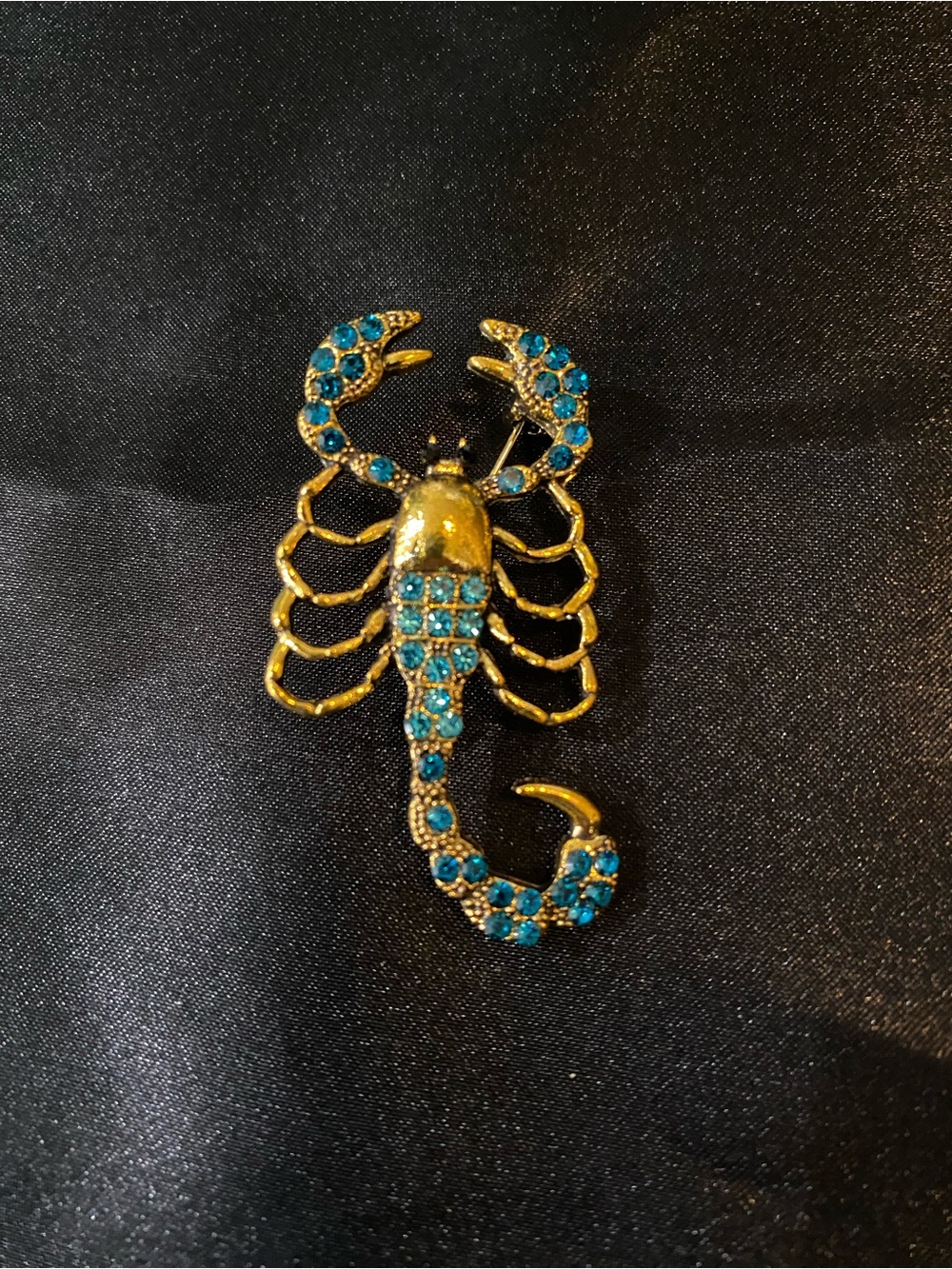 Gold-tone Scorpion Brooch with Blue Crystals